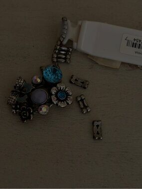 Guess ring damaged